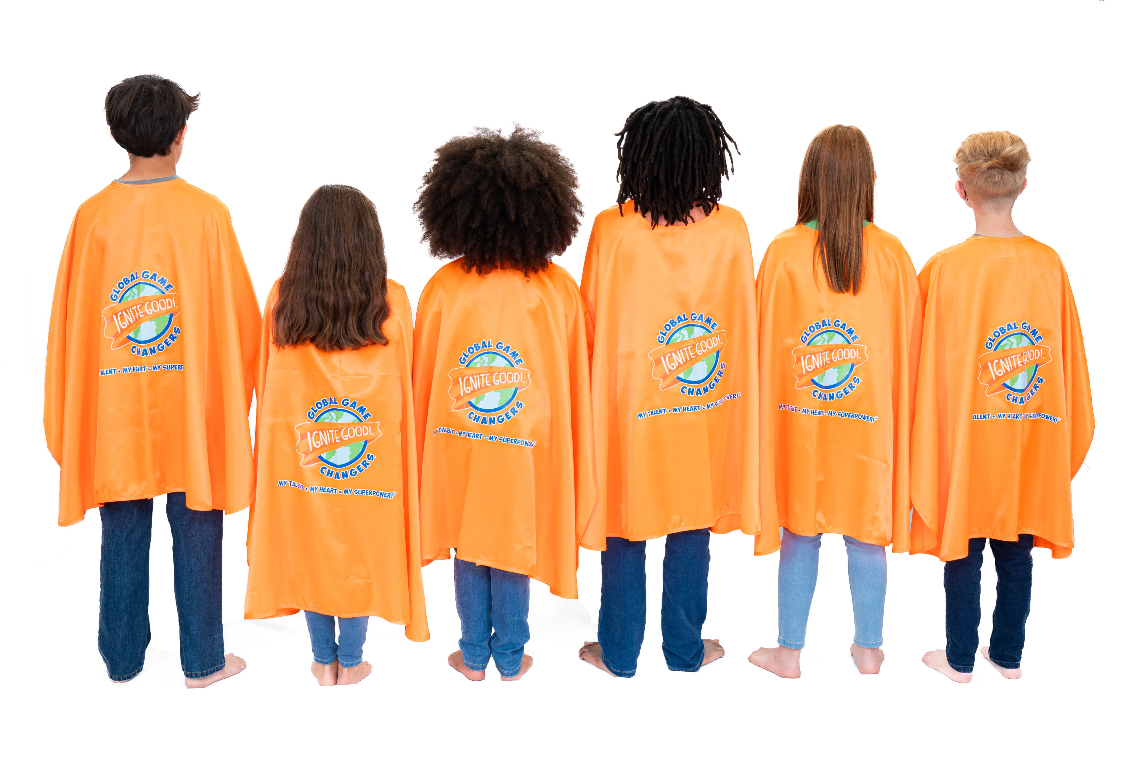 Children wearing orange superhero capes with Global Game Changers logo on a white background
