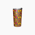 A tall insulated tumbler with a clear lid and black flip cover, featuring an all-over autumn maple leaf pattern in red, orange, and yellow on a dark background, shown on a light gray studio background.