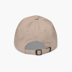 Beige baseball cap back with buckle on a white background
