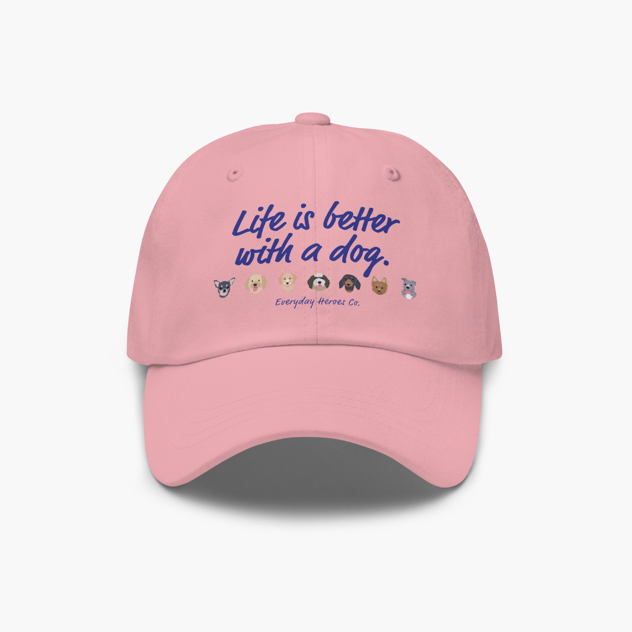 Pink cap with 'Life is better with a dog' text and dog icons on a white background