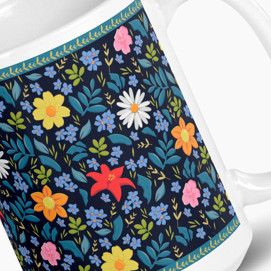 White mug with blue floral pattern on a white background