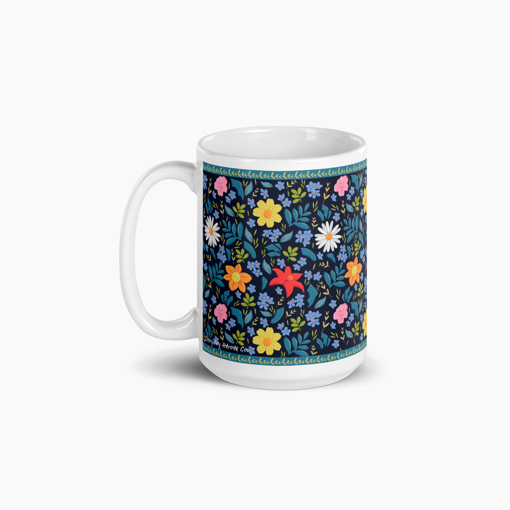 White mug with blue floral pattern on a white background