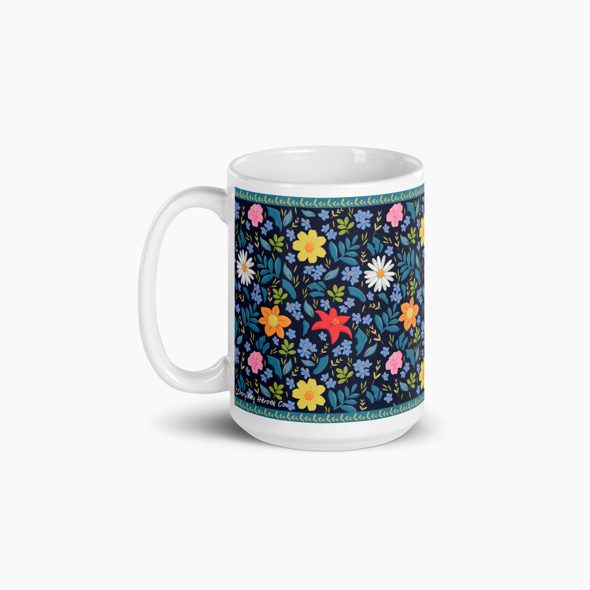 White mug with blue floral pattern on a white background