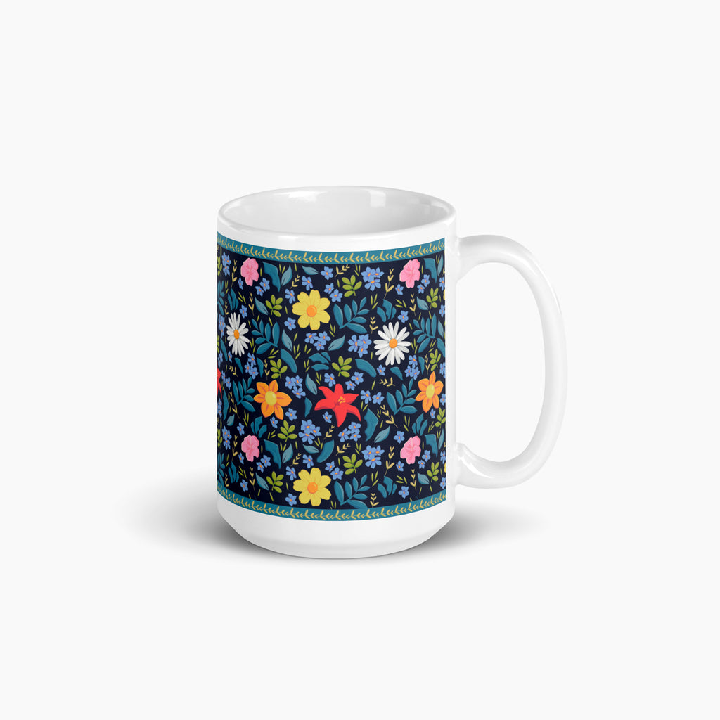 White mug with blue floral pattern on a white background