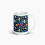 White mug with blue floral pattern on a white background