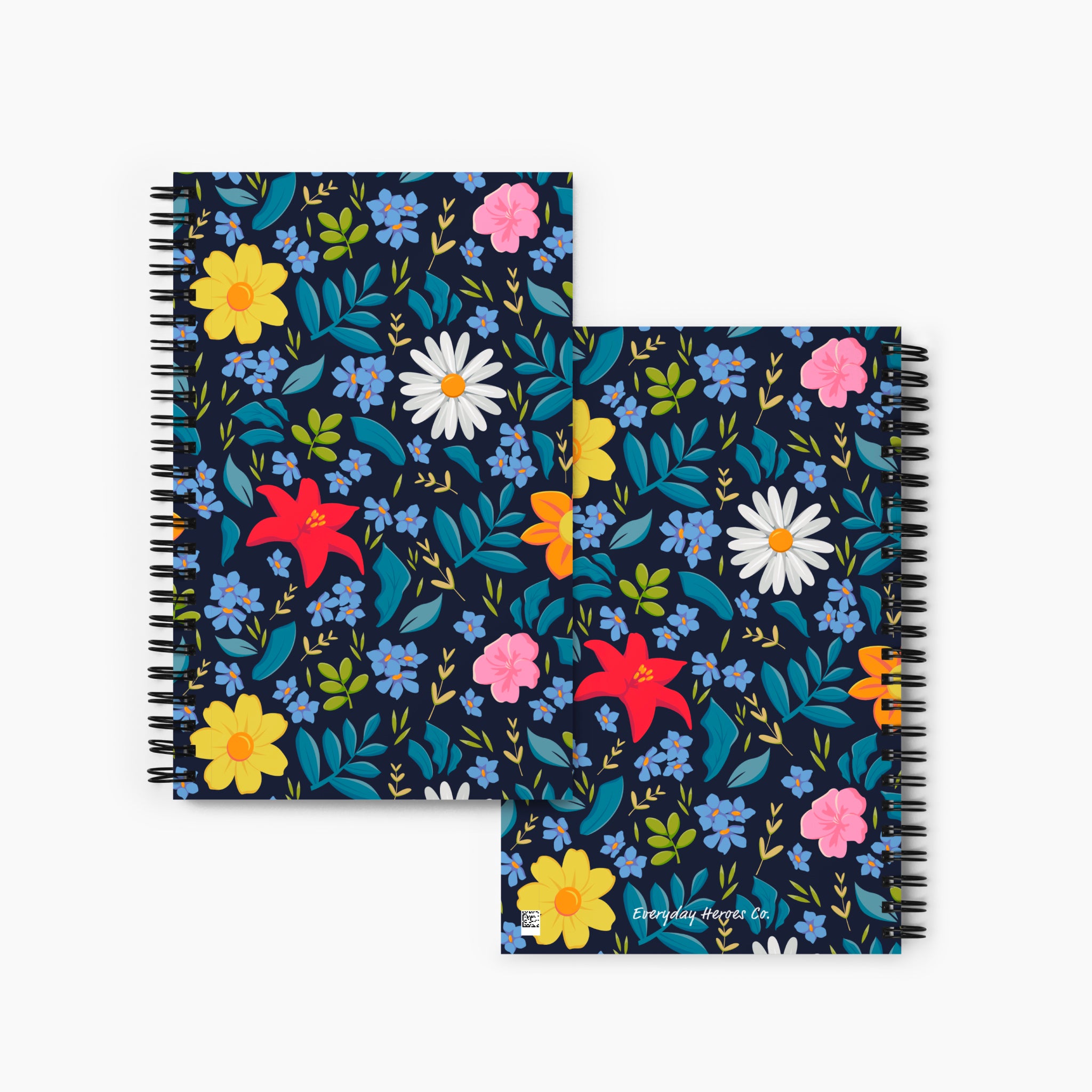 Front and Back covers of spiral notebooks with blue floral patterns on a white background