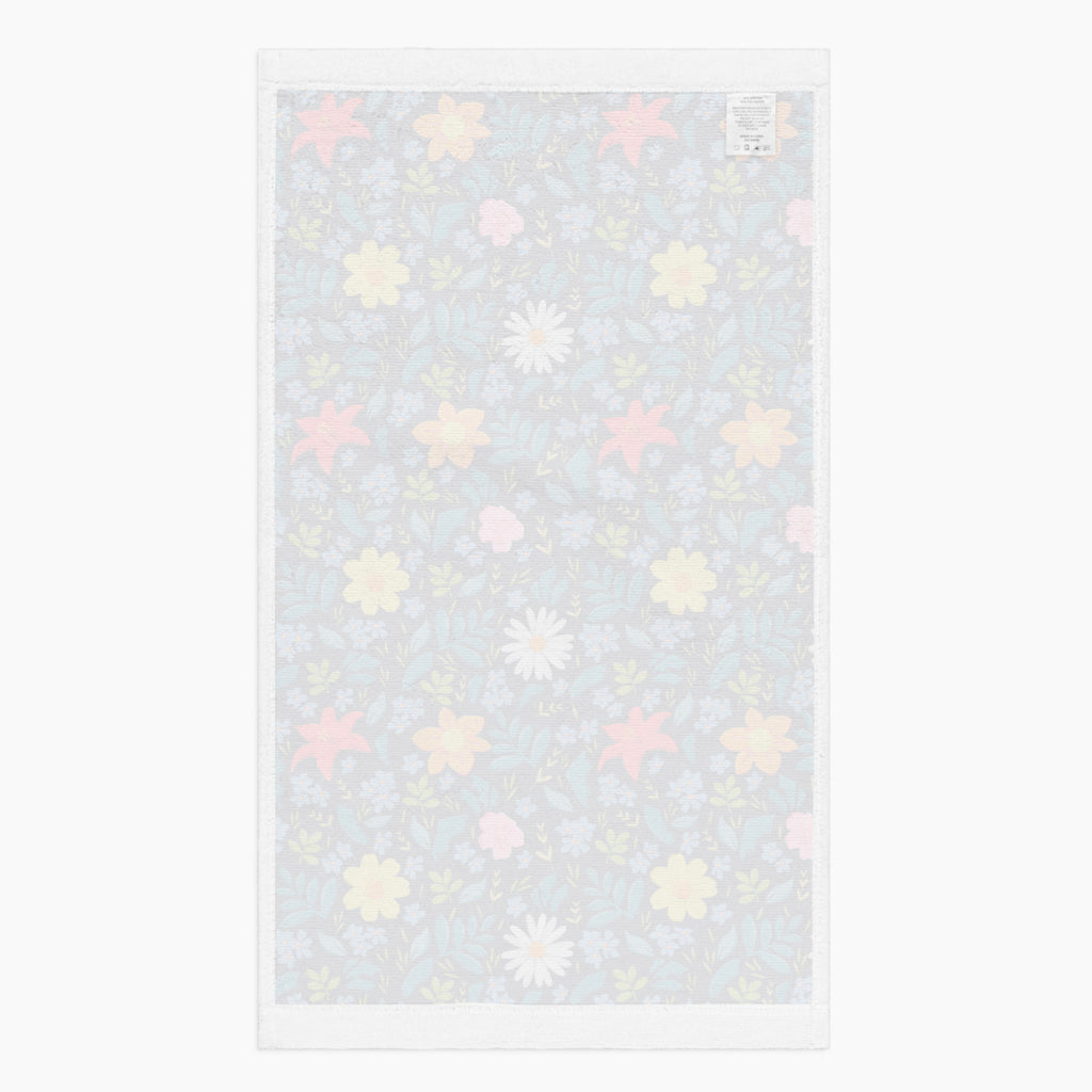 White back of Cloth kitchen hand towel with blue floral pattern on a white background