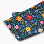 Cloth kitchen hand towel with blue floral pattern on a white background