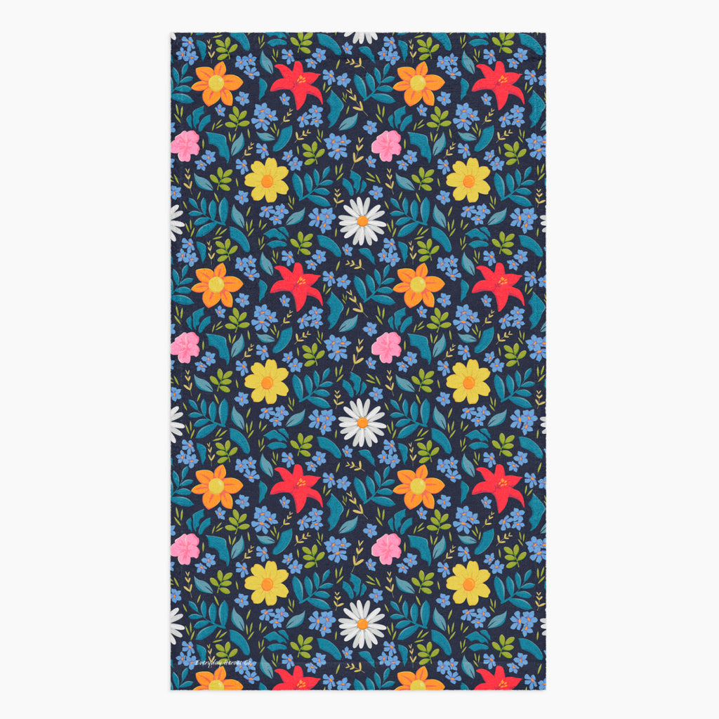 Cloth kitchen hand towel with blue floral pattern on a white background