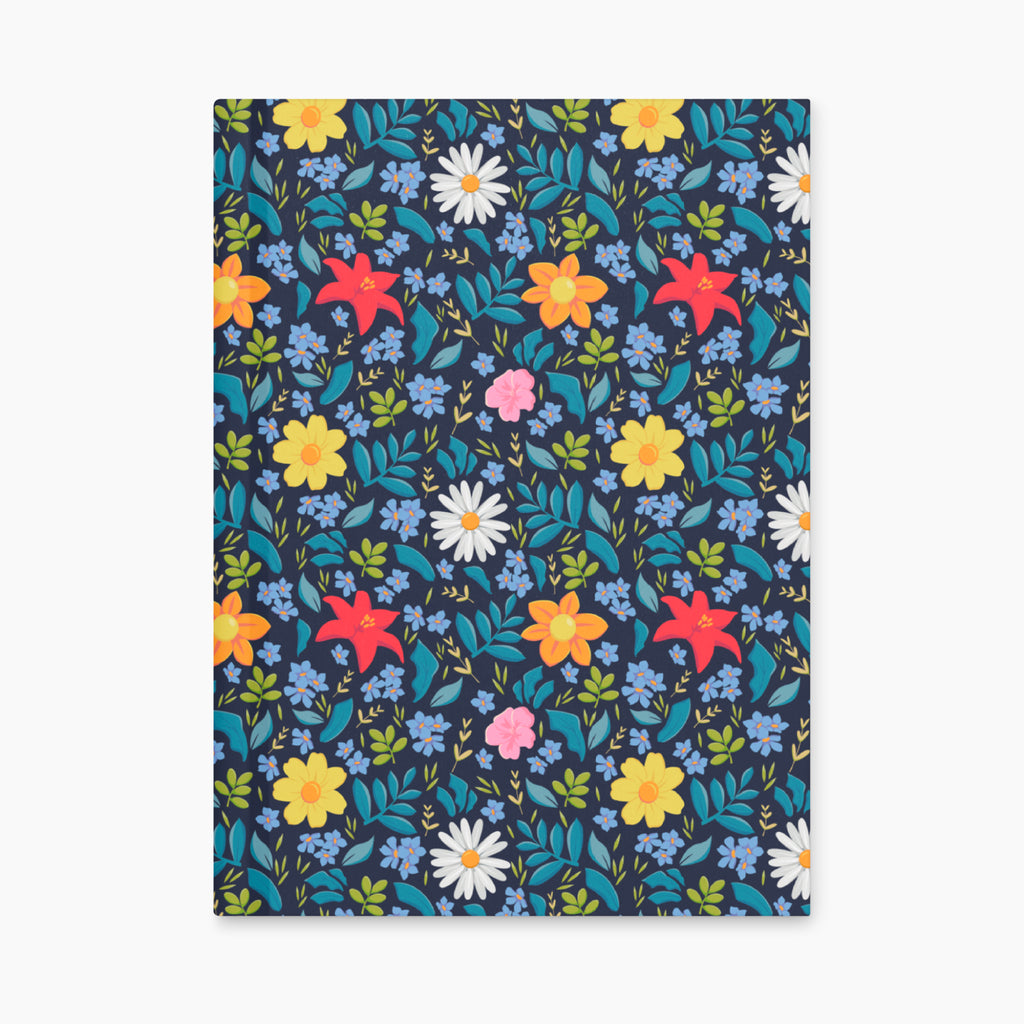 Hardcover journal with blue floral patterned front cover design on a white background