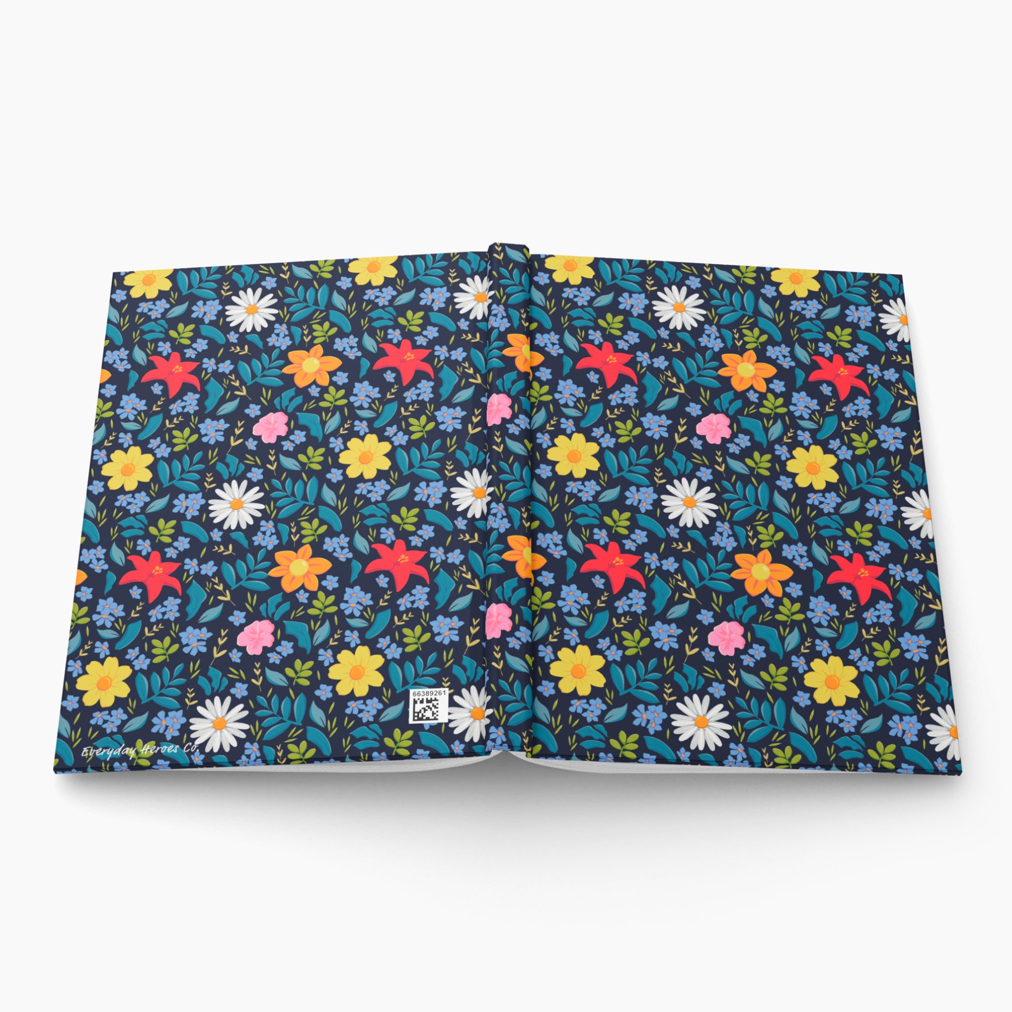 Hardcover journal with blue floral patterned cover design on a white background