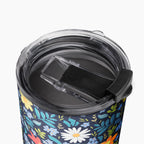 Tumbler with blue floral pattern on a white background