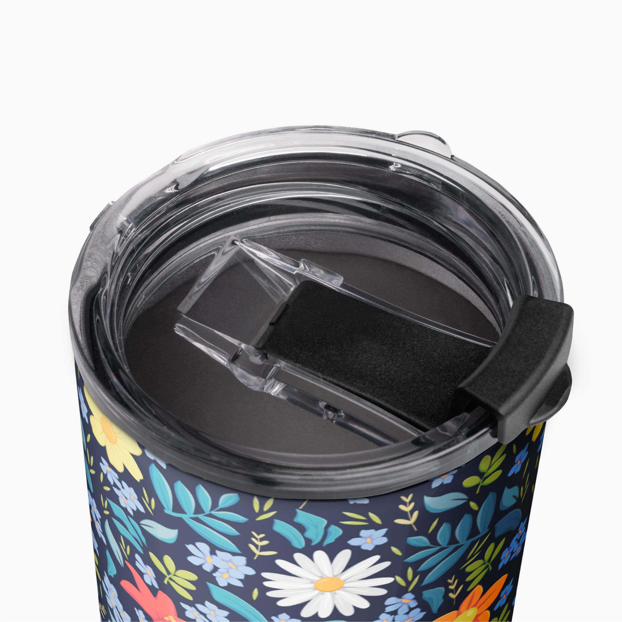 Tumbler with blue floral pattern on a white background