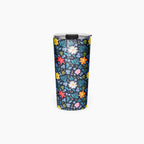 Tumbler with blue floral pattern on a white background