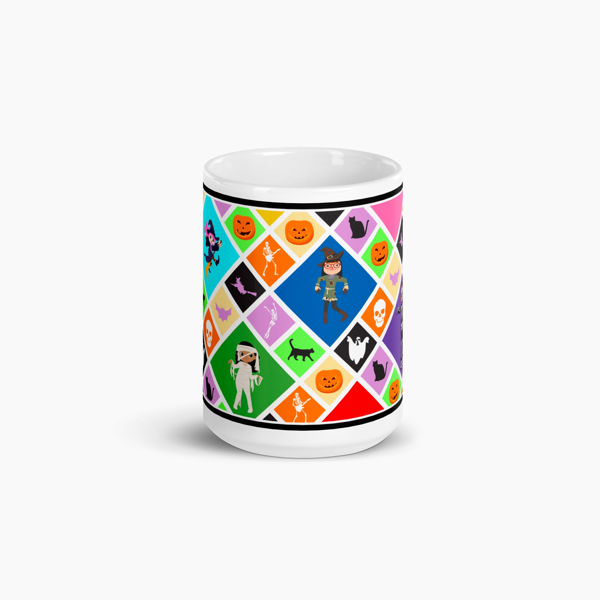 A white ceramic mug with a colorful Halloween-themed diamond pattern featuring pumpkins, ghosts, bats, a skeleton, and cartoon kids in costumes, shown on a light gray background.
