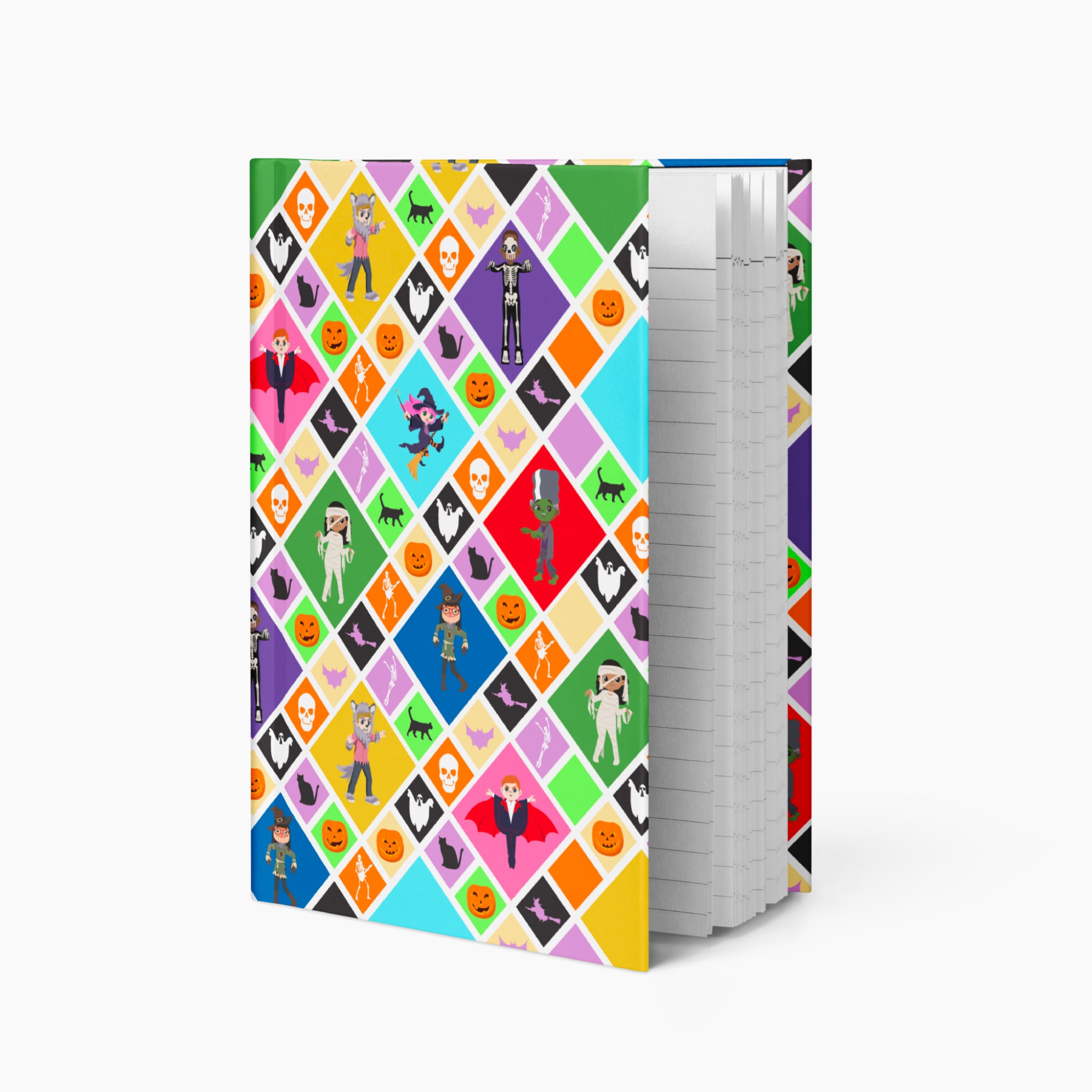 A notebook with a colorful diamond-patterned cover featuring Halloween-themed illustrations like pumpkins, ghosts, and cartoon kids in costumes, shown standing upright against a light gray background.