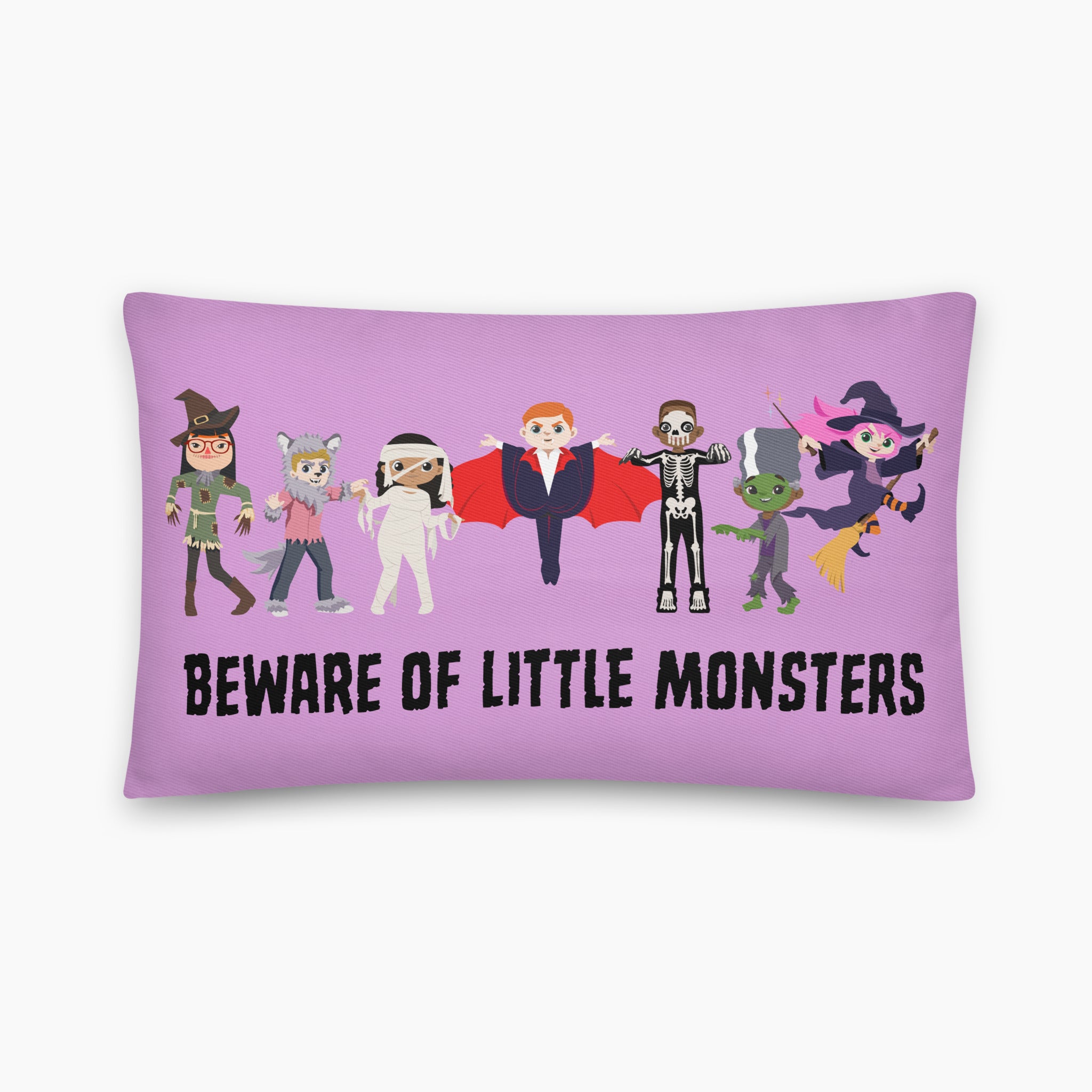 A rectangular lavender pillow featuring a cartoon graphic of seven Global Game Changers, friendly monsters in various costumes, with the text 'BEWARE OF LITTLE MONSTERS' printed in black below them.