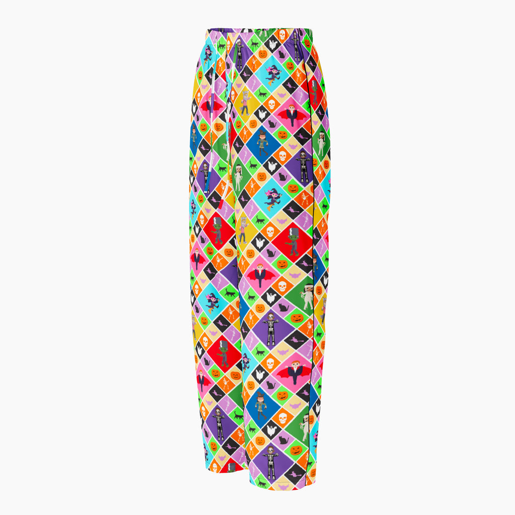 The side profile of a pair of colorful pajama pants with an all-over geometric pattern of repeating diamonds in multiple bright colors, featuring halloween themed pumpkins, skulls, batts, cats, witches, ghosts, and cartoon kids in costumes shown flat against a light gray background.