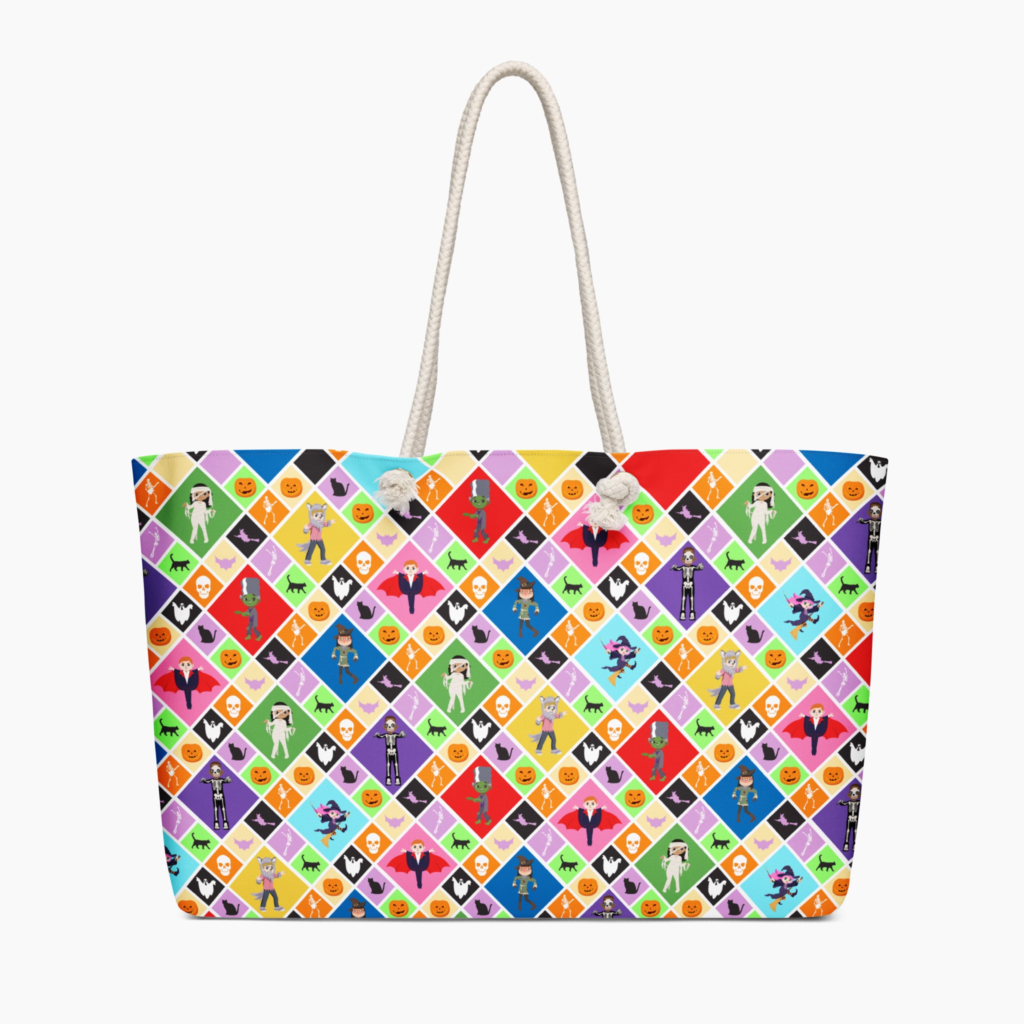 A front of a oversized weekender tote bag featuring a Halloween-themed diamond pattern with pumpkins, ghosts, bats, a skeleton, and cartoon kids in costumes, shown on a light gray background.