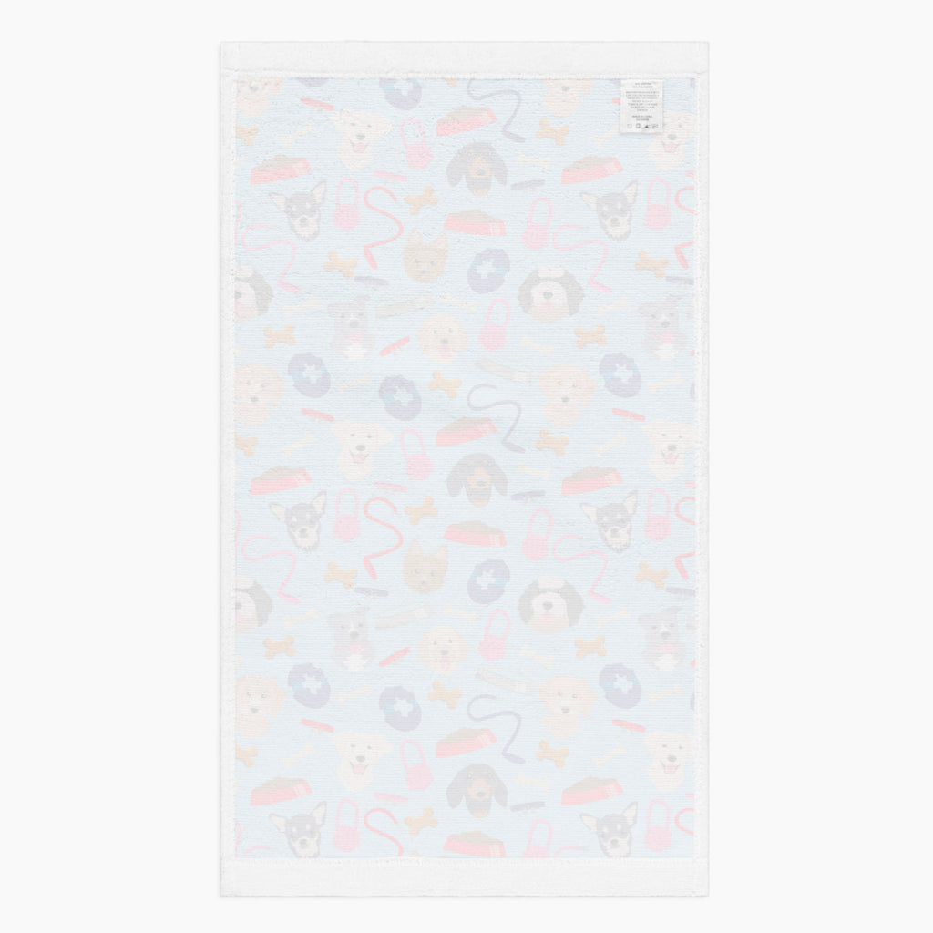 White back of cloth kitchen hand towel with dog gear pattern on a white background