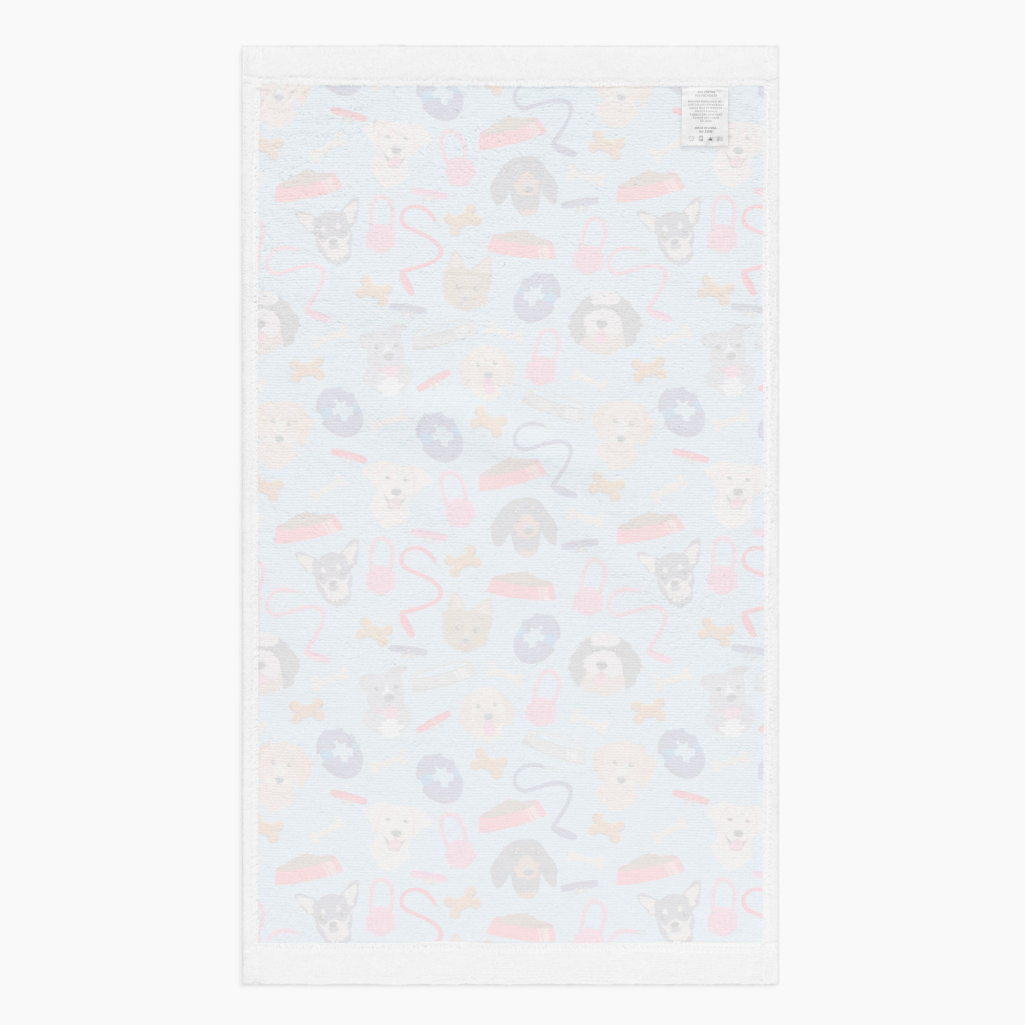 White back of cloth kitchen hand towel with dog gear pattern on a white background