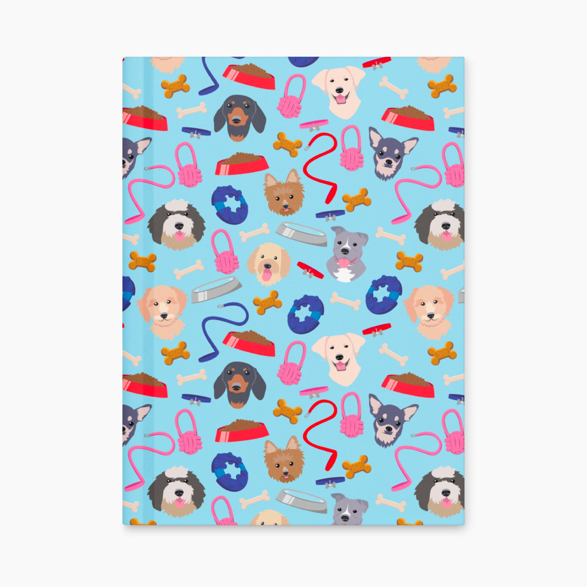 Hardcover journal with dog-themed patterned front cover design on a white background