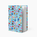 Hardcover journal with dog gear patterned cover design and lined pages on a white background
