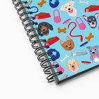 Spiral Notebook exterior, close-up with dog-themed design on a white background