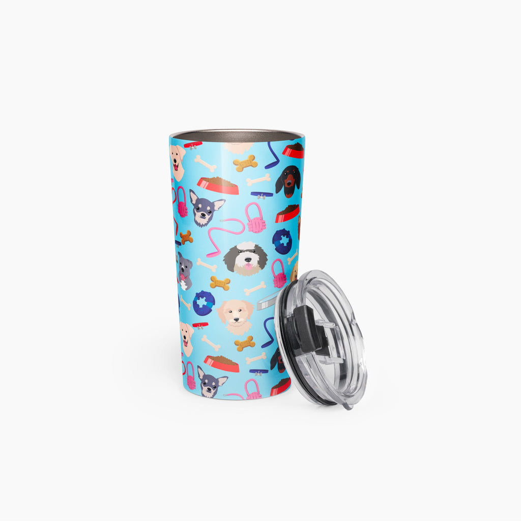 Tumbler with a dog-themed pattern on a light blue background