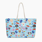 Tote bag with dog-themed pattern on a light blue background