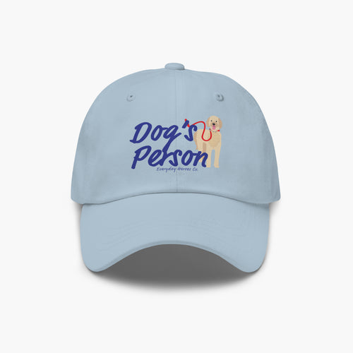 Light blue cap with 'Dog's Person' text and dog illustration on a white background