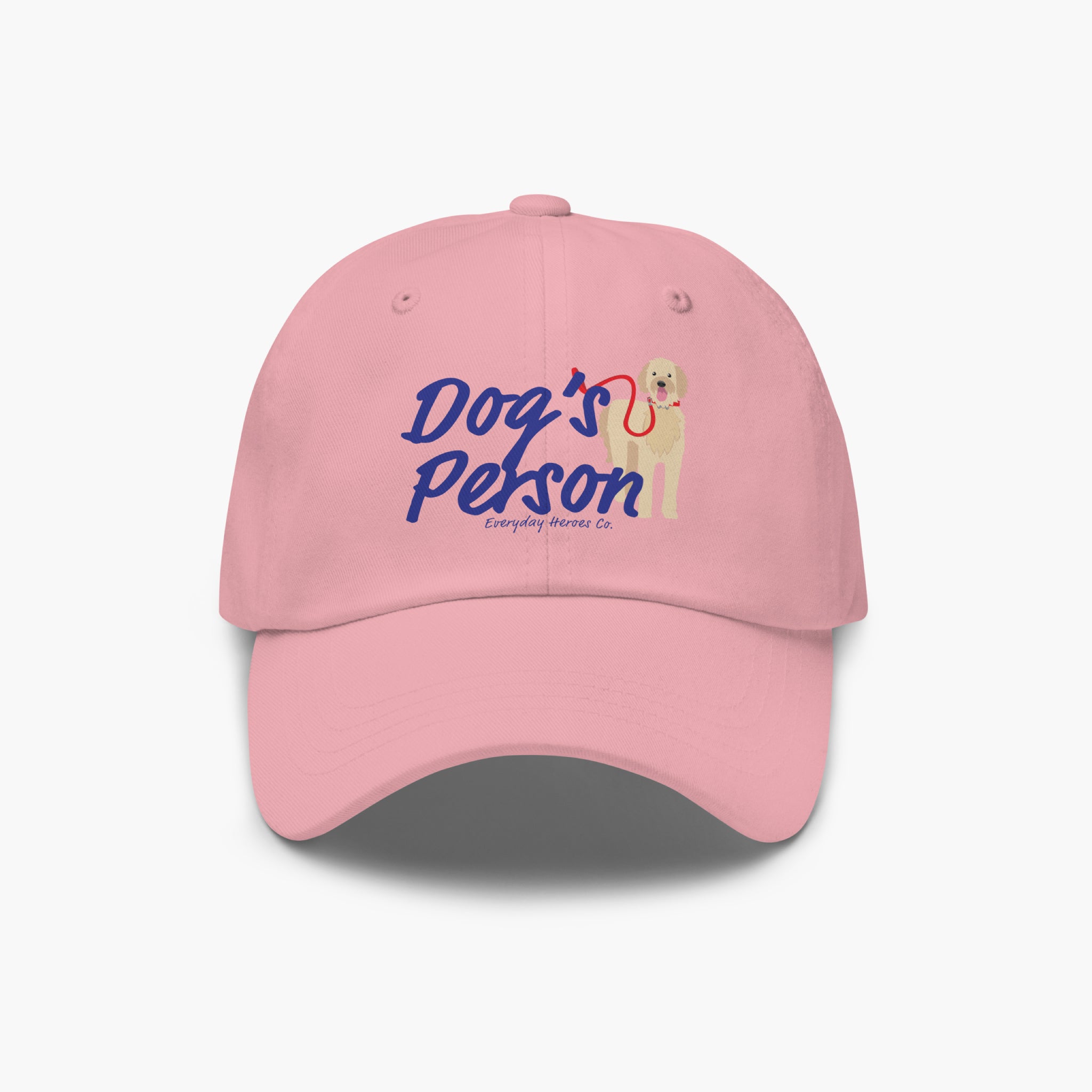 Pink cap with 'Dog's Person' text and dog illustration on a white background