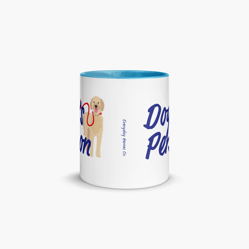 White mug with blue interior, dog illustration, and text on a white background
