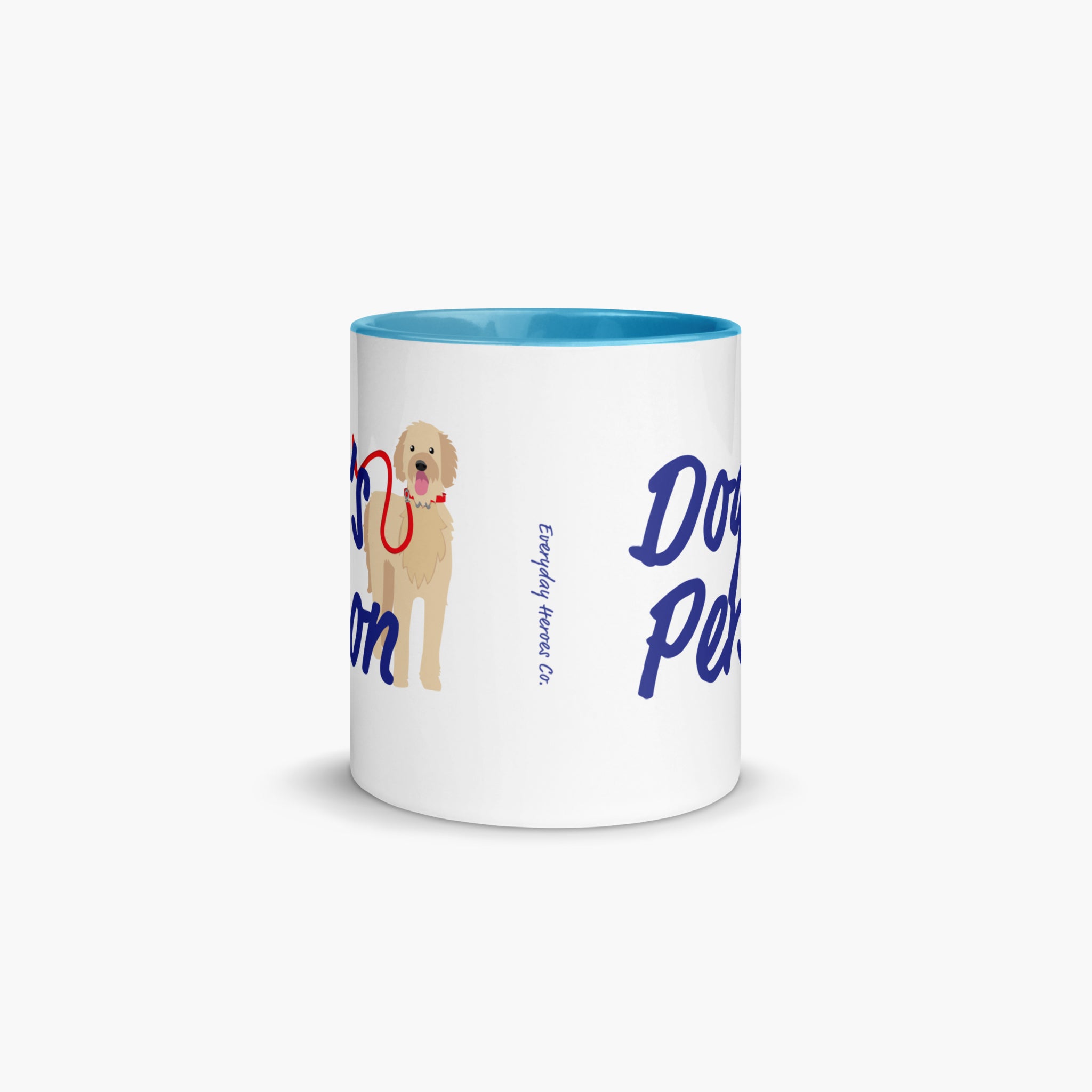 White mug with blue interior, dog illustration, and text on a white background