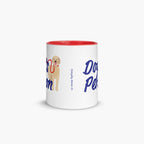 White mug with red interior and handle, featuring a dog illustration and text on a white background.