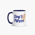 Mug with navy handle and interior featuring 'Dog's Person' text and a dog illustration on a white background