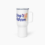 White travel mug with 'Dog's Person' text and a dog illustration on a white background