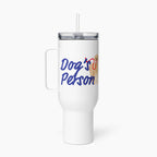 White travel mug with 'Dog's Person' text and a dog illustration on a white background
