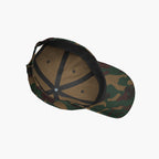 Camouflage baseball cap on a white background