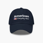 Navy blue cap with 'American Everyday Hero' text and flag on a white background