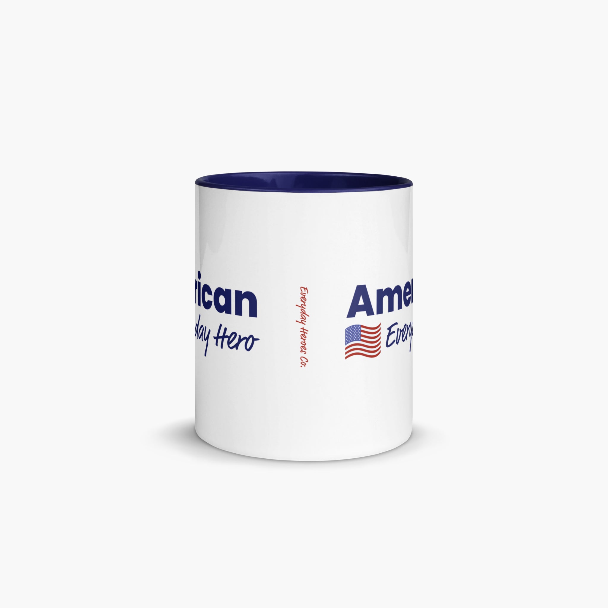 White mug with navy interior and text on a white background