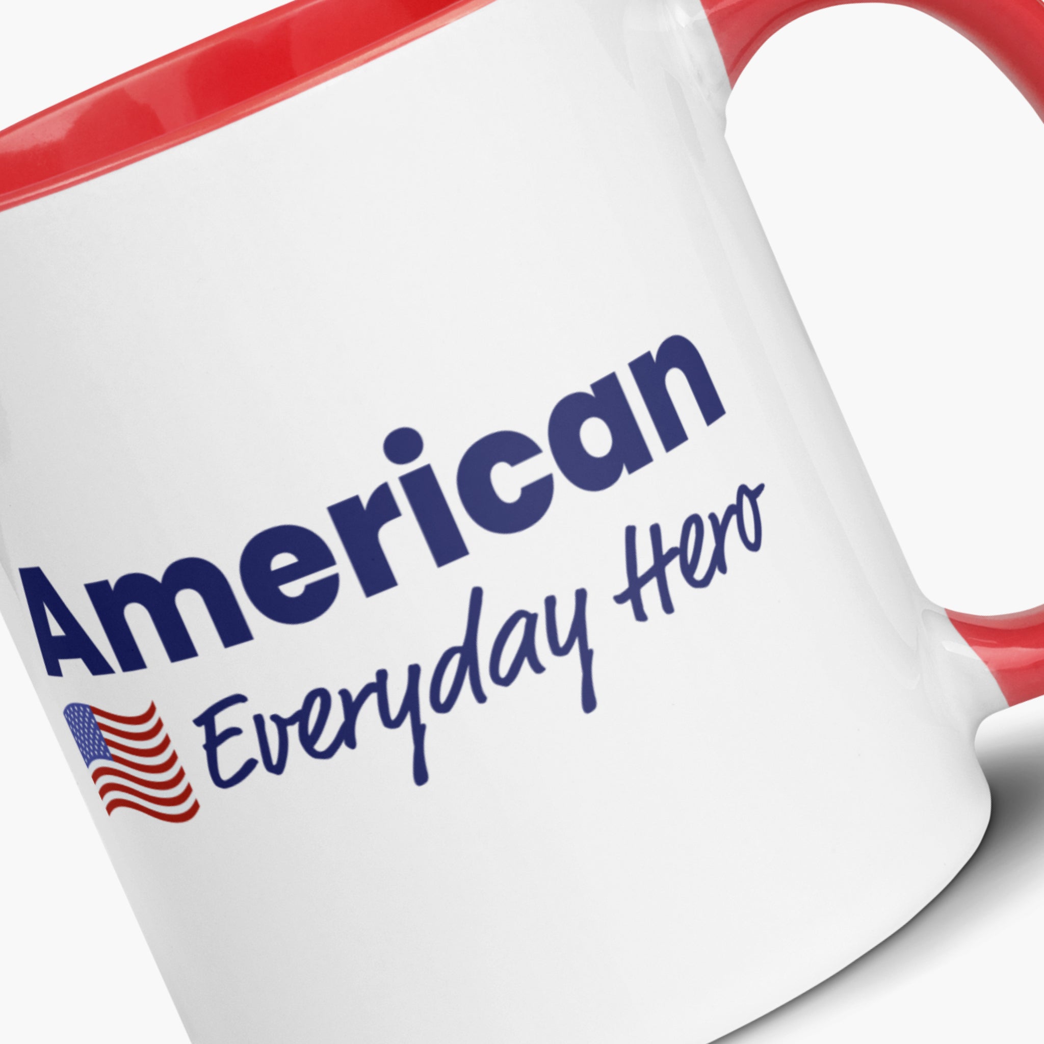 Closeup of a Mug with 'American Everyday Hero' text and American flag design on a white background