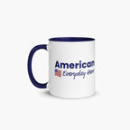 White mug with blue handle and 'American Everyday Hero' text on a white background