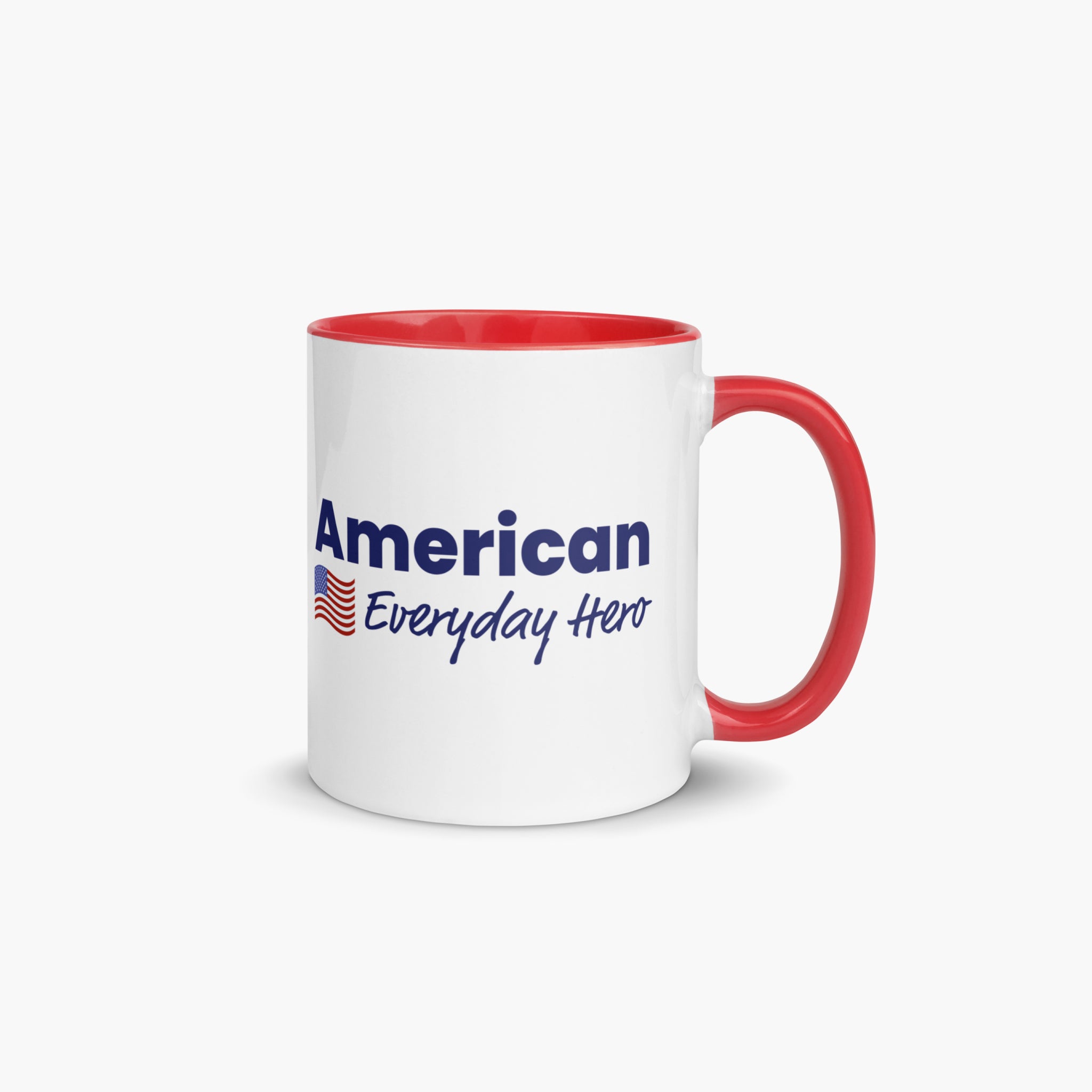 White mug with red interior and handle featuring 'American Everyday Hero' text and American flag.