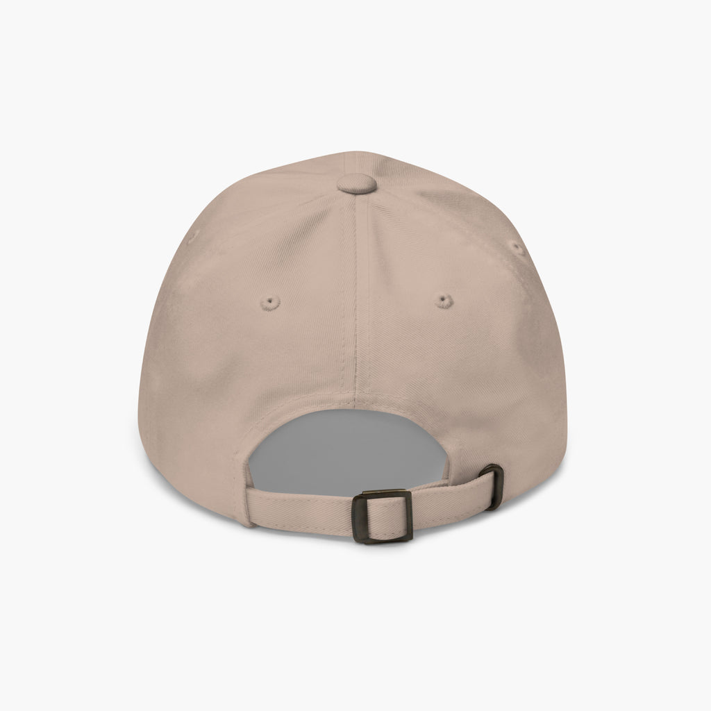Sandstone colored baseball cap back with a buckle on a white background