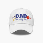 White cap with 'DAD Everyday Hero' text and dad-themed graphics on a white background