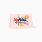 Card with floral design and text 'Mom Everyday Hero' on a pink background