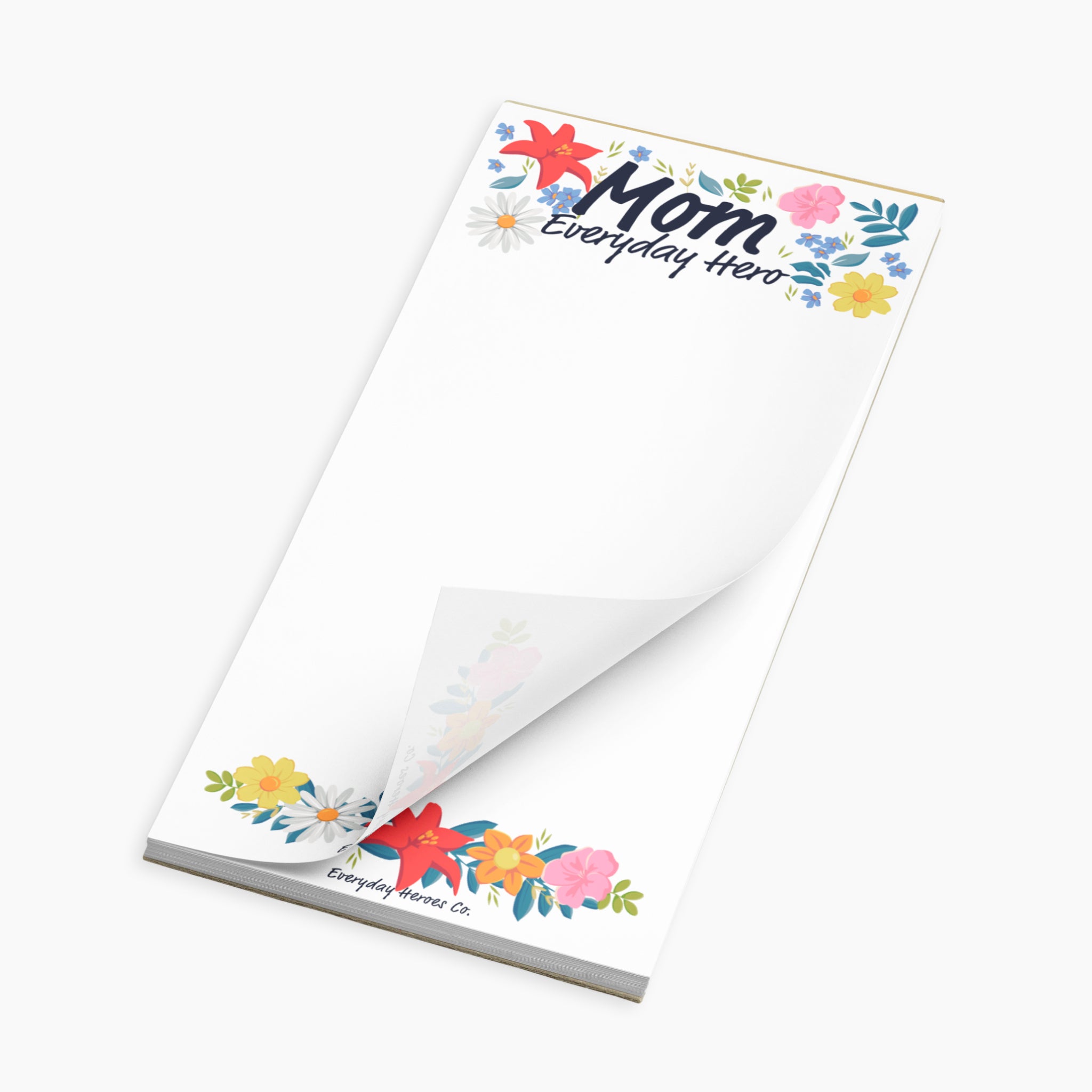 Notepad with floral design and 'Mom Everyday Hero' text on a white background