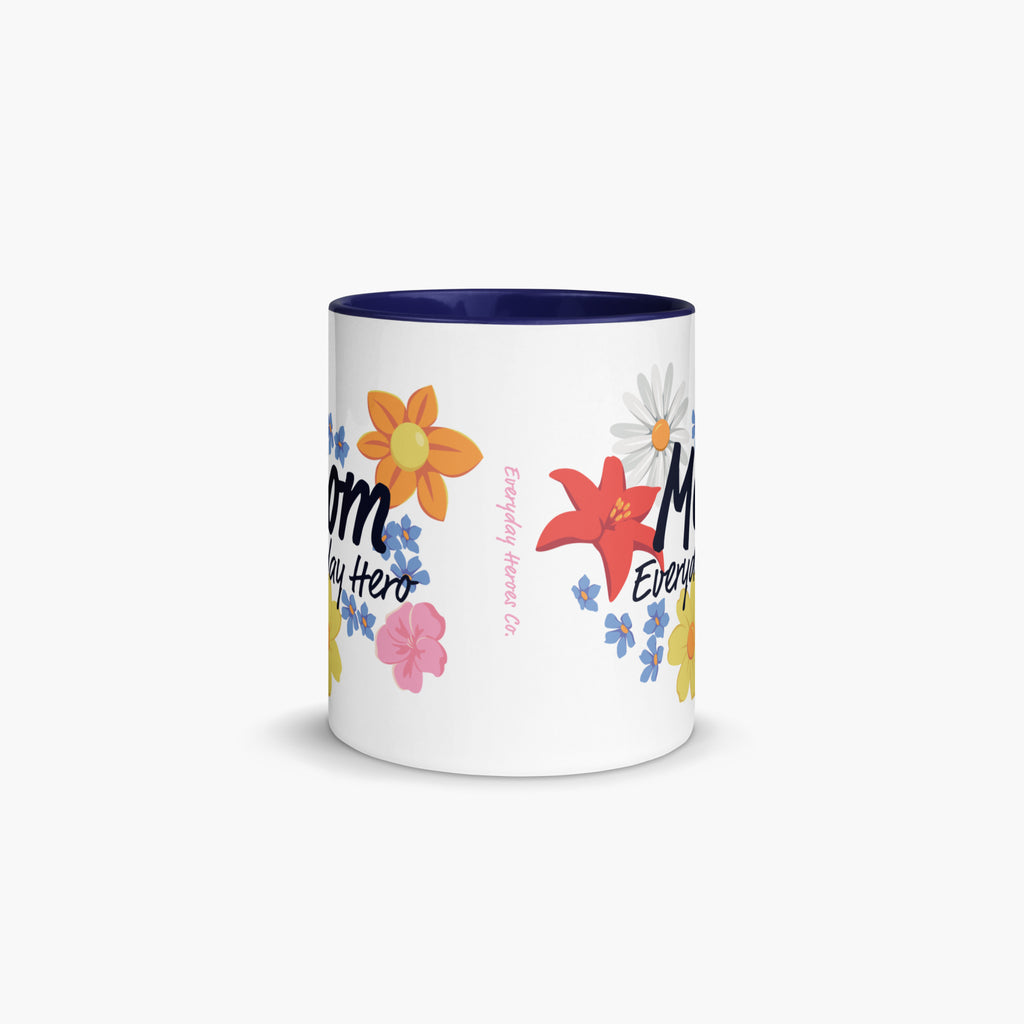 Mug with navy handle and interior featuring 'Mom Everyday Hero' text and colorful flowers on a white background