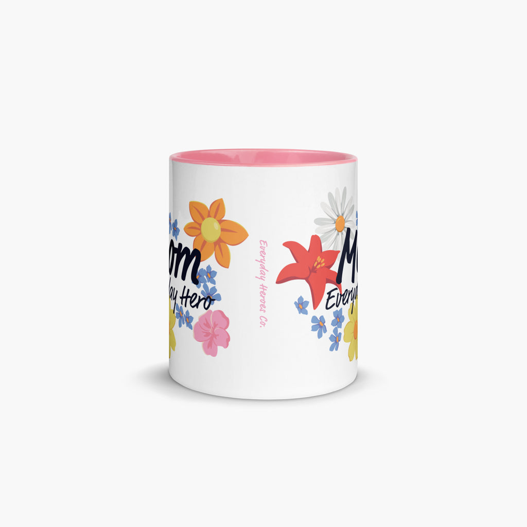 Mug with pink handle and interior featuring 'Mom Everyday Hero' text and colorful flowers on a white background